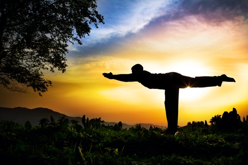 Yoga Posture: Warrior III, MASSAGE Magazine