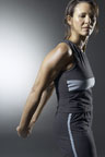 Image of a woman stretching her arms behind her
