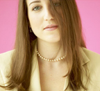 Image of woman With long hair, looking slighty annoyed