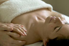 Image of a woman getting a massage face up