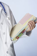 Image Person holding Medical Records