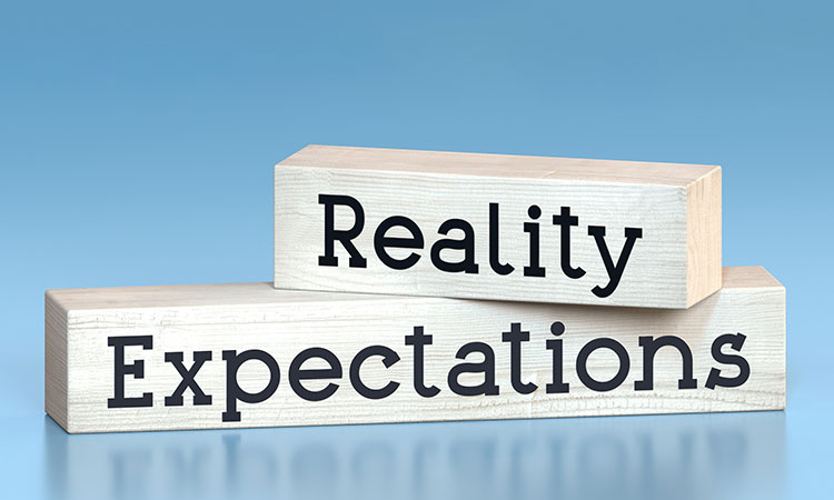 An image of wooden blocks containing the words "reality" and "expectations" is used to illustrate the concept of how massage can be perceived as advanced pain management.