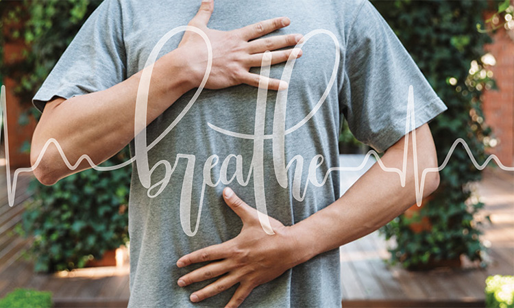 An image of a person with their hand on their diaphragm, with the word "breathe" superimposed over it, is used to illustrate the concept of bringing your attention to your breathing.