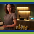 Image for an article about the stages of massage business growth. Image of massage therapist preparing a treatment room.