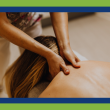 Featured image for an article about the power of massage therapy in treating stress. Image of woman receiving an upper body massage.