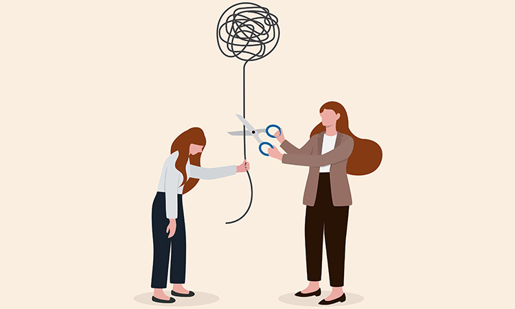 An image of a person holding what looks like a tangled string hovering above her like a balloon is clipped with a scissors, in order to illustrate the concept of relieving stress.