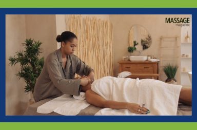 Image for an article discussing tips for hiring at a massage therapy business. Image of massage therapist working on client.