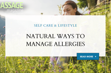 woman outside in field sneezing