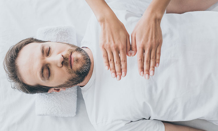 If you are looking to add depth to your massage therapy sessions—without adding any more strain on your bod—consider learning Reiki. The most well-known type of energy healing, Reiki can give you a new tool to use to help your clients.