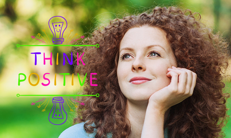 An image of a smiling woman, overlaid with the words "think positive" and drawings of lightbulbs, is used to illustrate the concept of positive motivation.