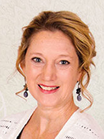 A headshot of author Gael Wood