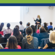 Image for an article about hosting community events to boost outreach. Image of an audience attending a public presentation.