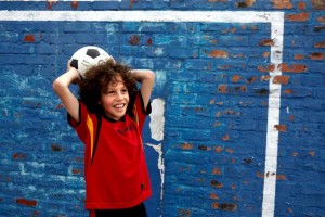 child with soccer ball