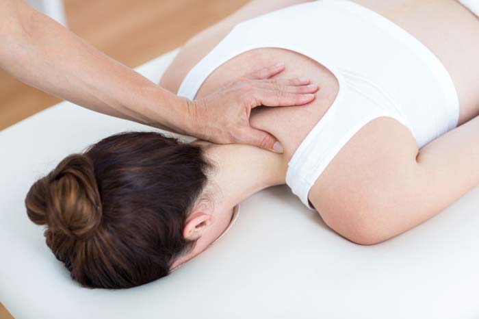 massage client face down on table