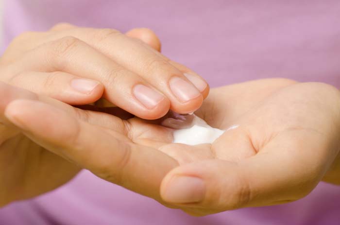 hands with massage cream