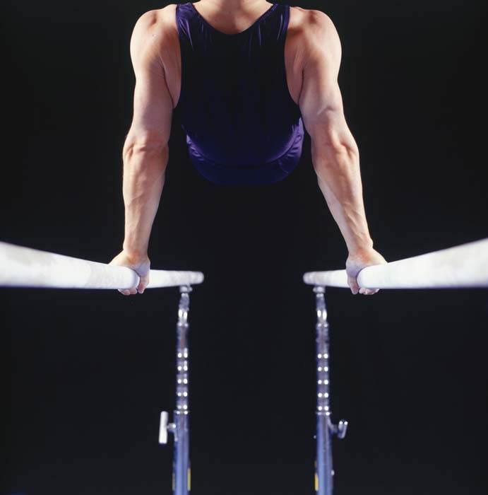 gymnast on parallel bars