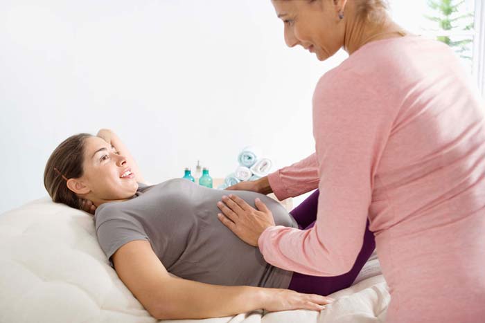 therapist with pregnant woman