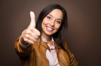 woman giving thumbs up